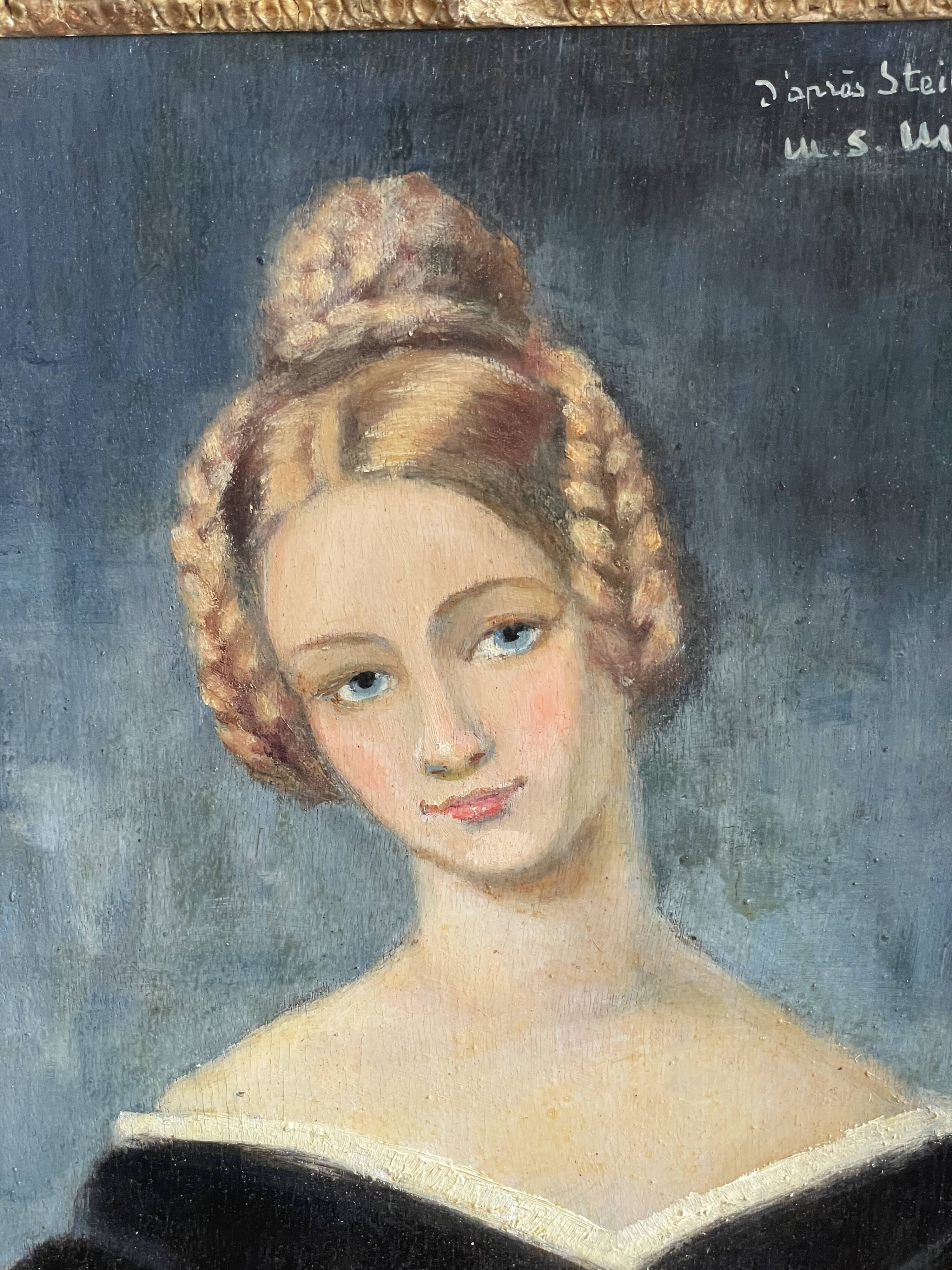 Portrait of young woman painting on wood