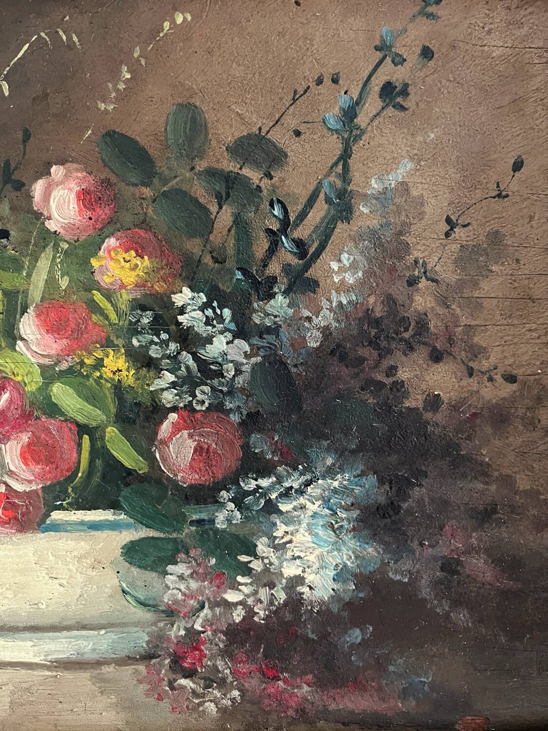 Old oil painting on wood of a bouquet of flowers signed Petit.