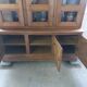 Showcase library with two sections in solid oak.