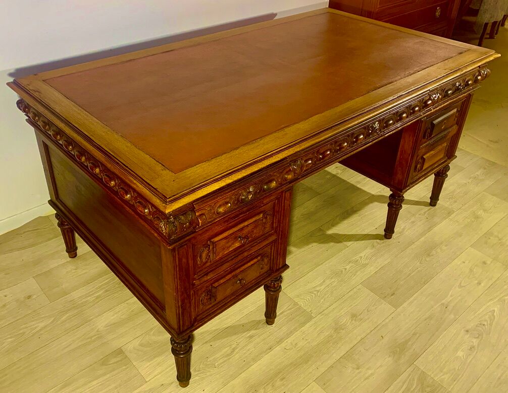 Renaissance style desk in solid oak, richly carved