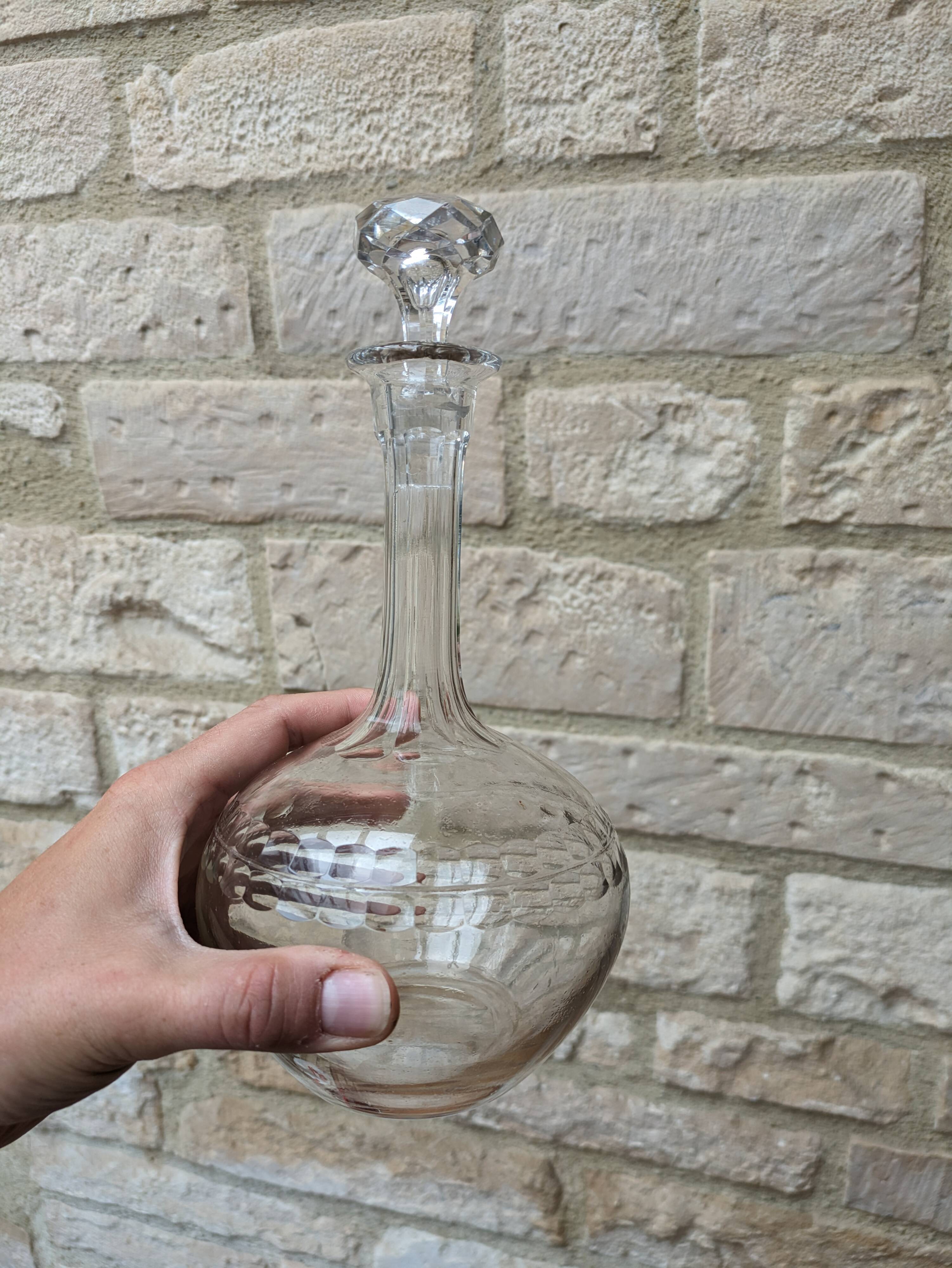 Antique round chiseled glass carafe with stopper
