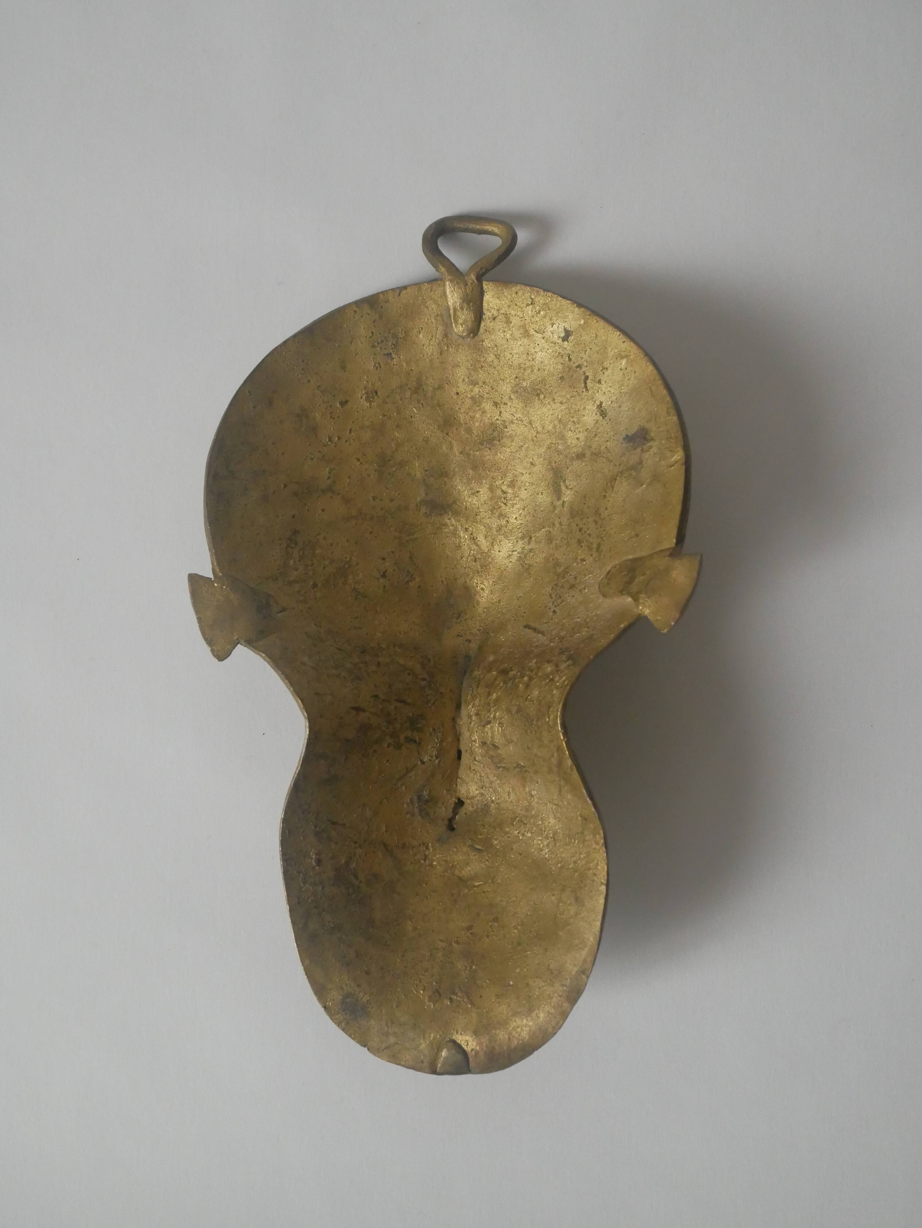 Brass mask wall sculpture tribal decorative object African art handmade vintage