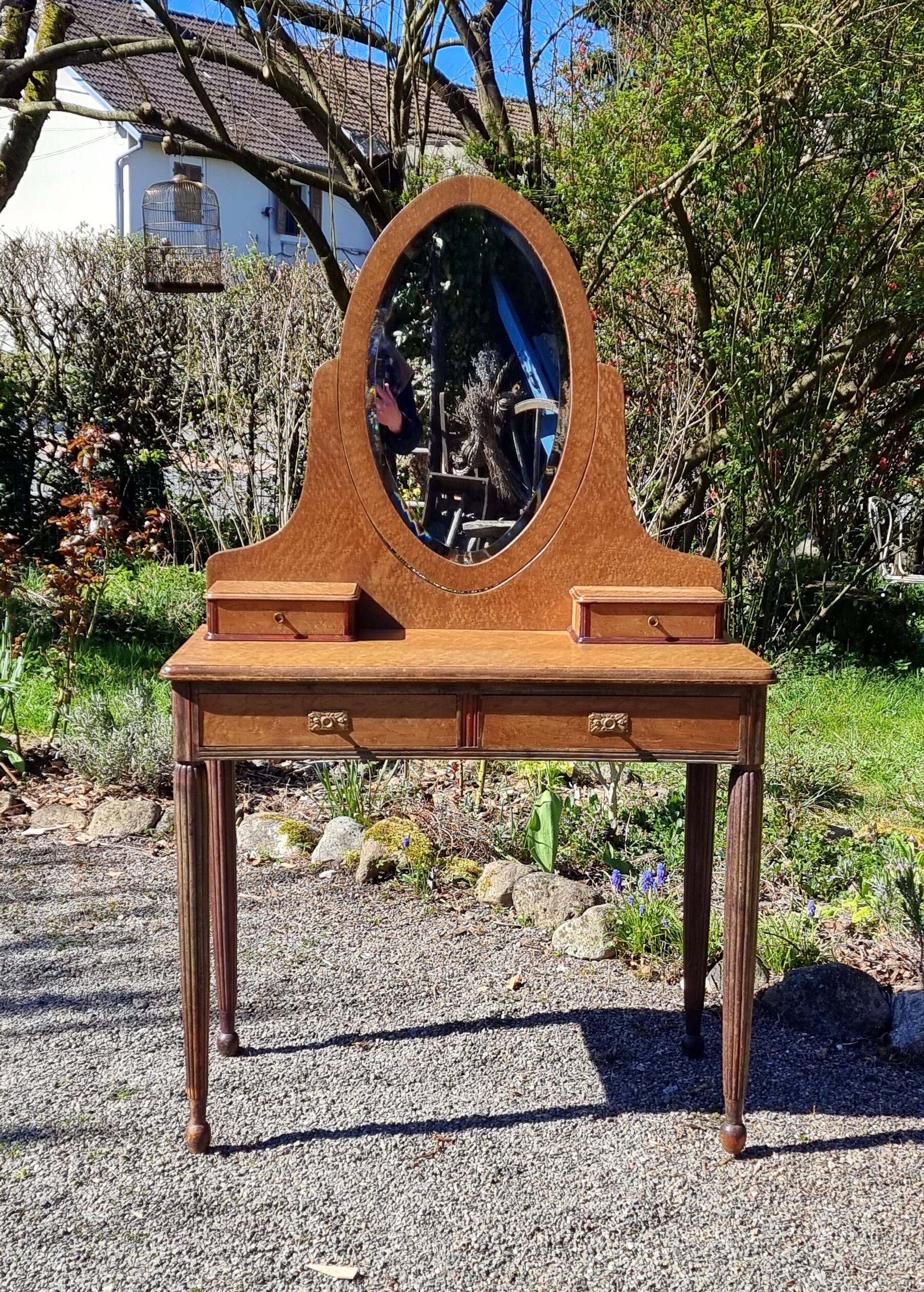 Dresser from the early 19th century with a cheval mirror.
