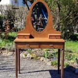 Dresser from the early 19th century with a cheval mirror.