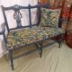 Pretty painted and upholstered bench in green and blue.