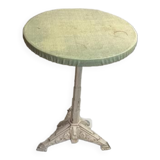 Round table with cast iron stand