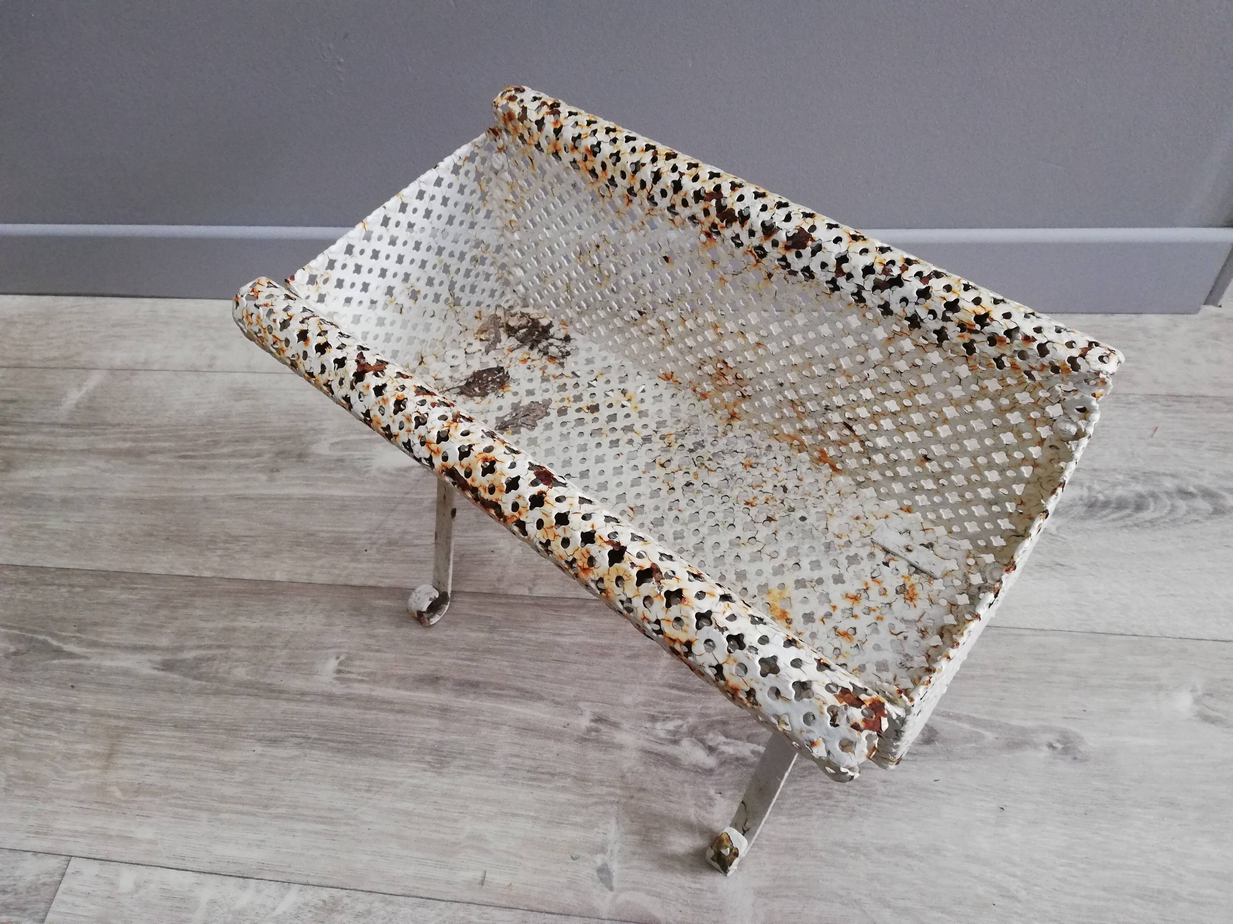 Wrought iron planter with pot cover perforated sheet metal