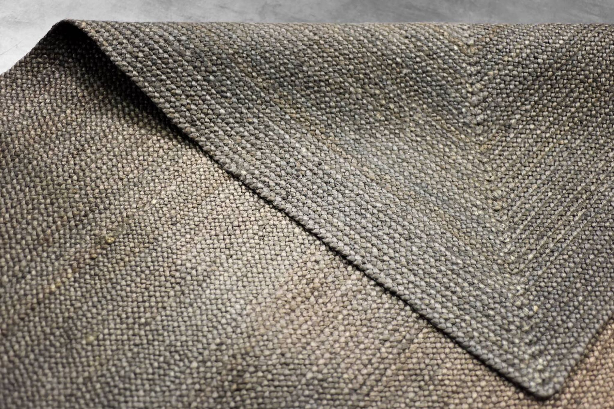 Brown flat-woven jute Indian rug, 1970.