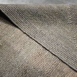 Brown flat-woven jute Indian rug, 1970.