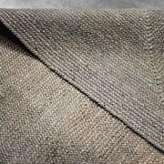 Brown flat-woven jute Indian rug, 1970.