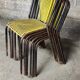Six chaises en métal perforé seducta René Malaval