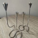 Pair of modernist silver metal candlesticks