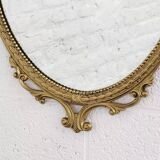 Italian oval brass medallion mirror