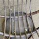Fauteuil pivotant en rotin et coussin velours marron années 70