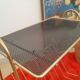 Pedestal table, door magazines in gilded metal years 50 - 60