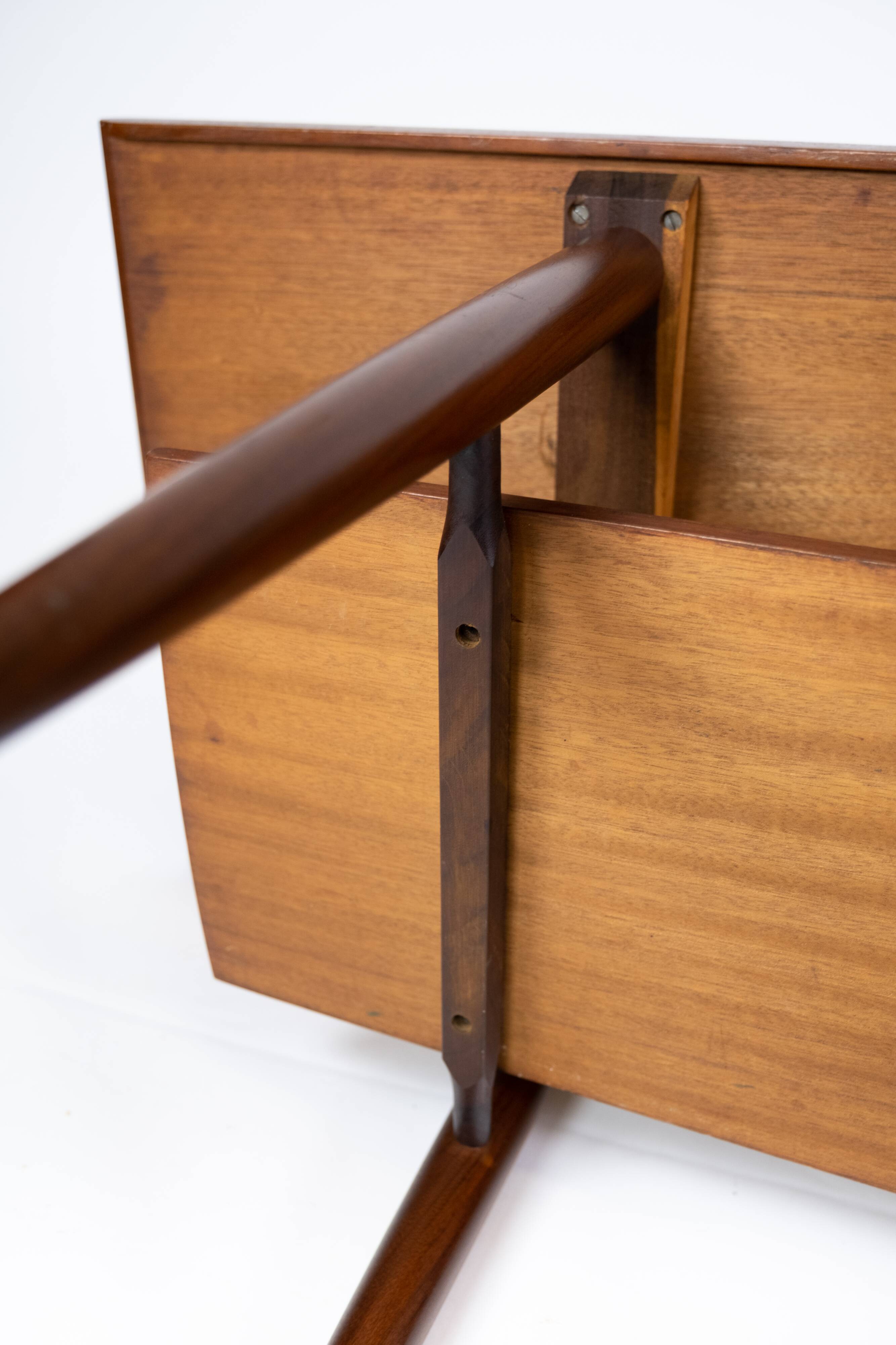 Coffee table in teak with blue tiles of danish design from the 1960s.