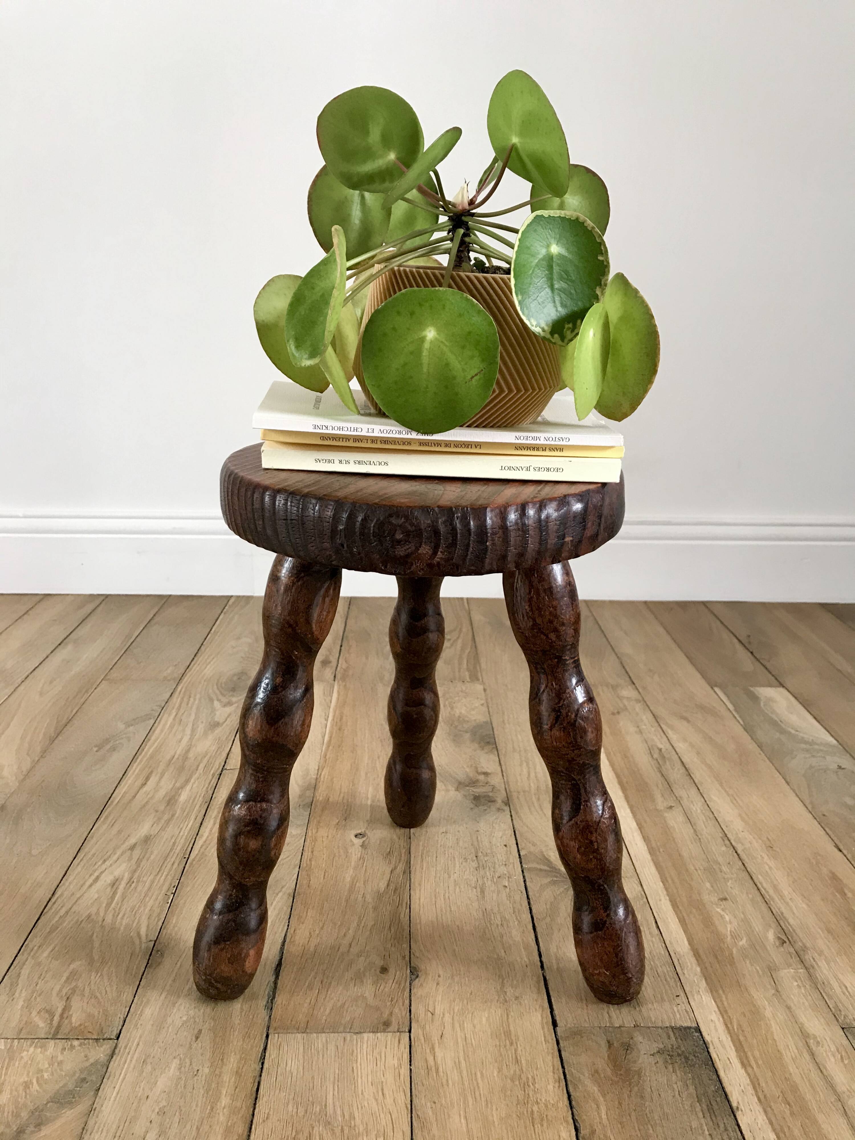 low stool in solid turned wood from the 70s