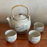 Asian-style teapot and cups
