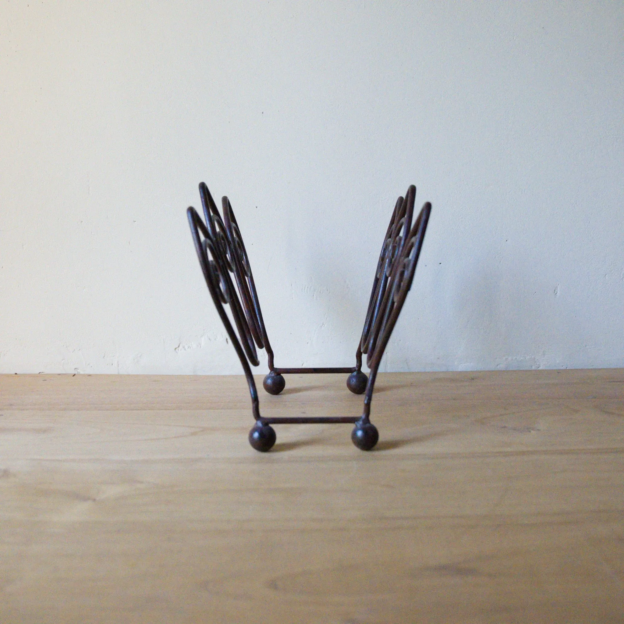 Wrought iron magazine rack, François Liguori for Studio Pescatore