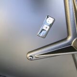 Charles Eames all-black lounge chair and ottoman, Herman Miller edition