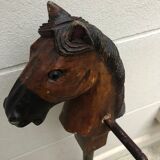 Wooden horse on stick