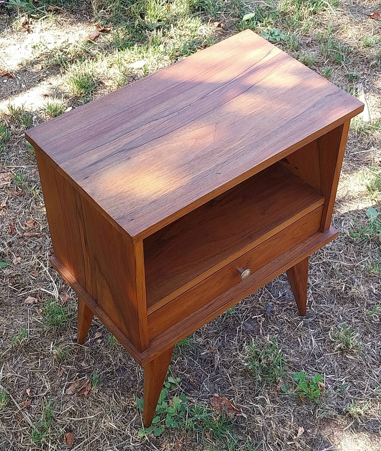 Wooden bedside table with compass feet