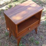 Wooden bedside table with compass feet