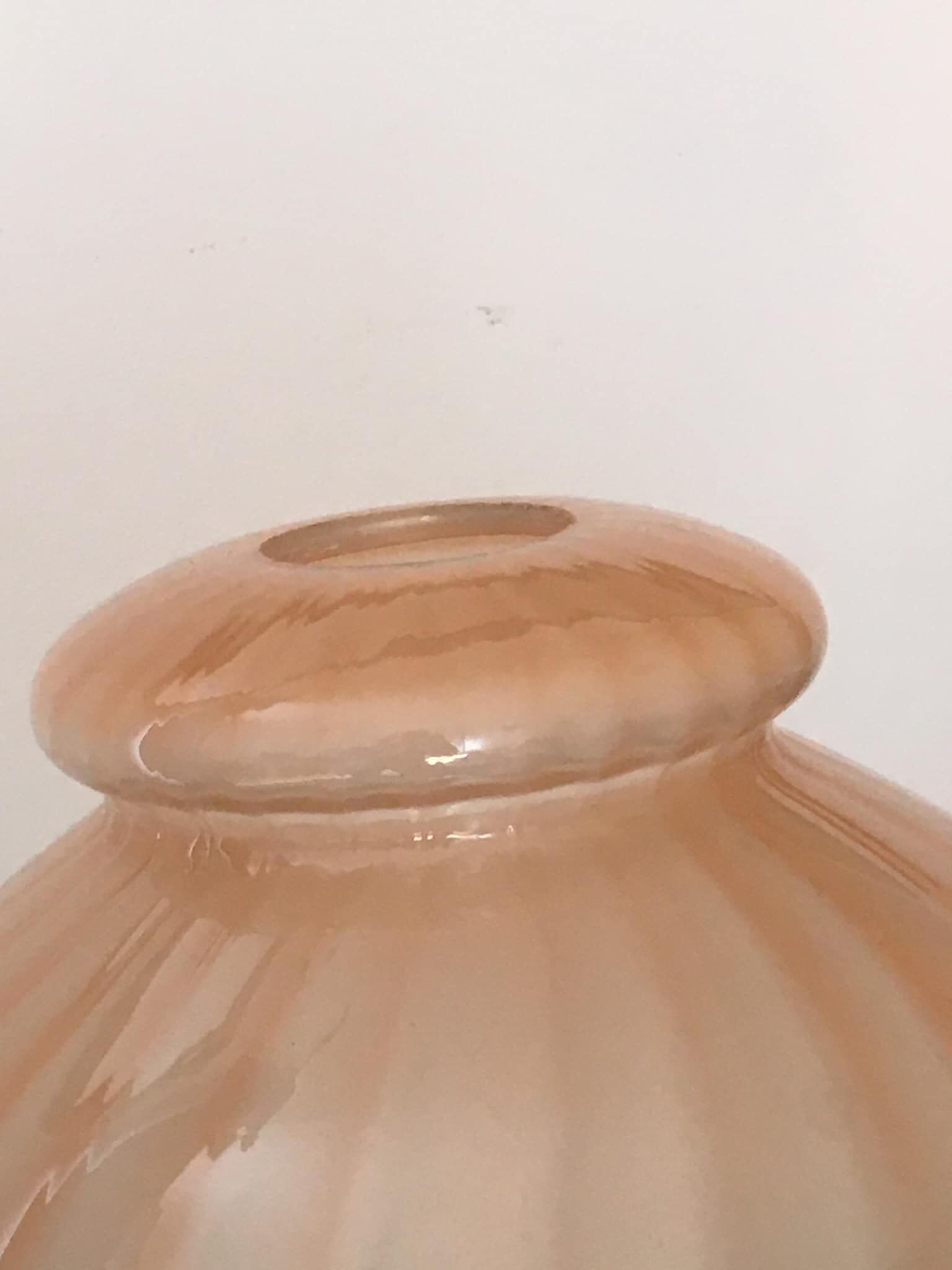 Peach-colored transparent glass collar globe