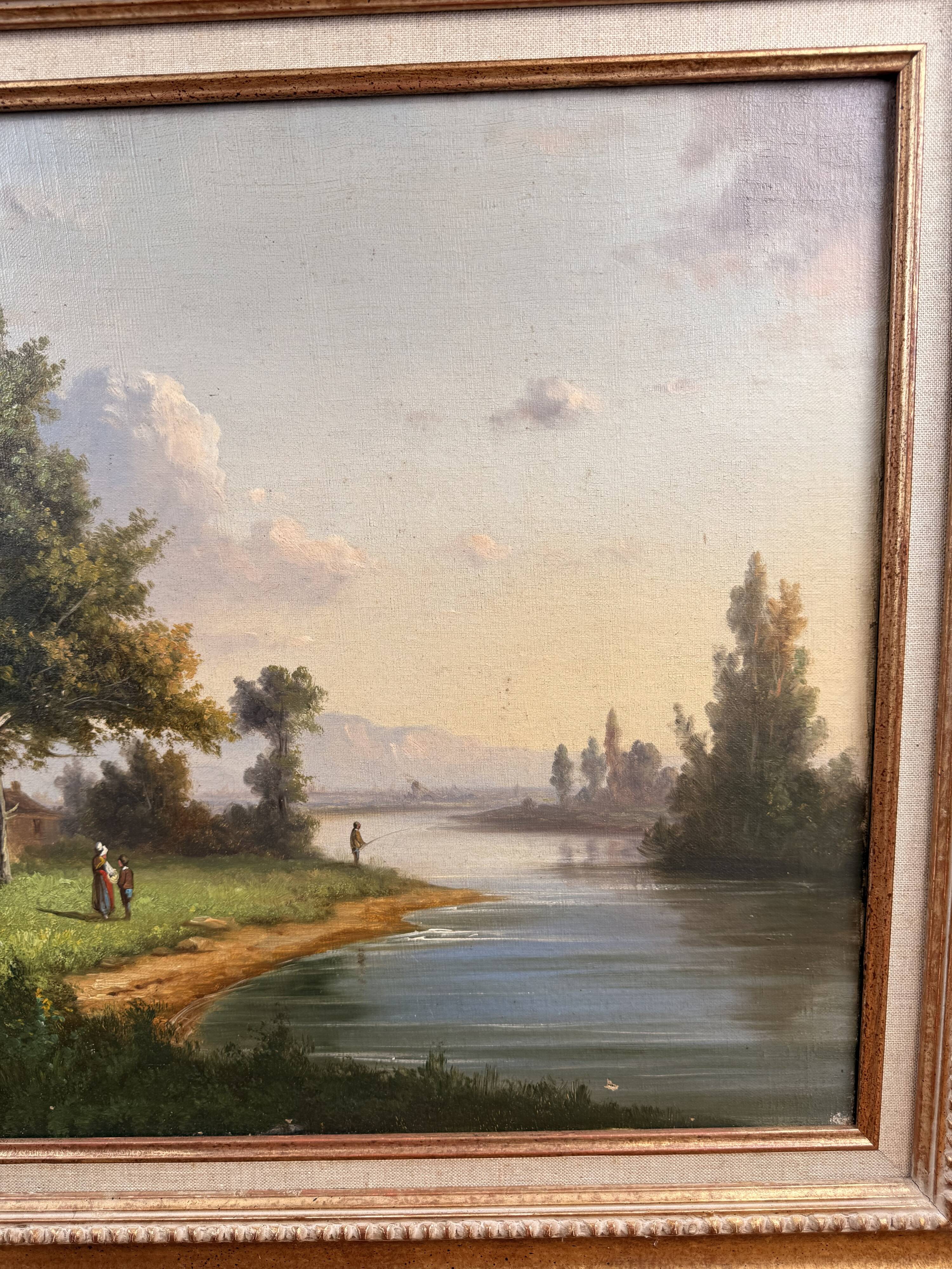 Oil on canvas landscape by the river – antique gilded frame