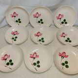 9 hollow plates caps in faience with decor of a rosebud