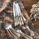 Series of 24 antique silver metal cutlery