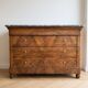Antique walnut commode with a grey marble top.