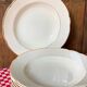 7 ivory and gold deep plates Villeroy and Boch Mettlach