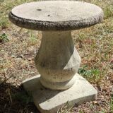 Old garden furniture in reconstituted stone