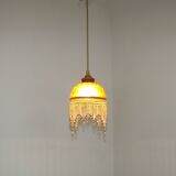 Vintage French amber mottled glass hanging ceiling light with beaded fringe.