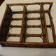 Varnished rattan wall shelf