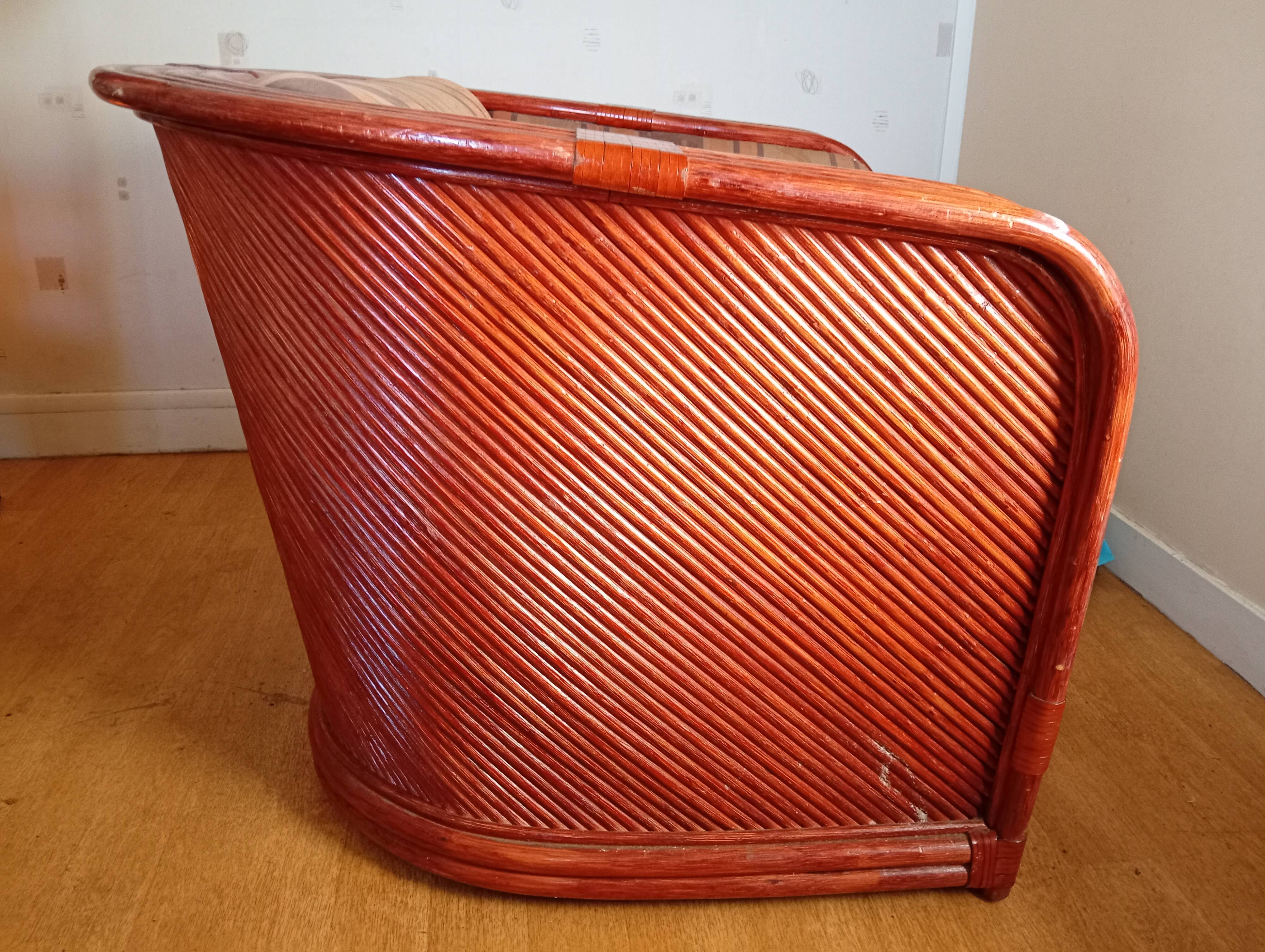 Red rattan and bamboo armchair, Maugrion salon