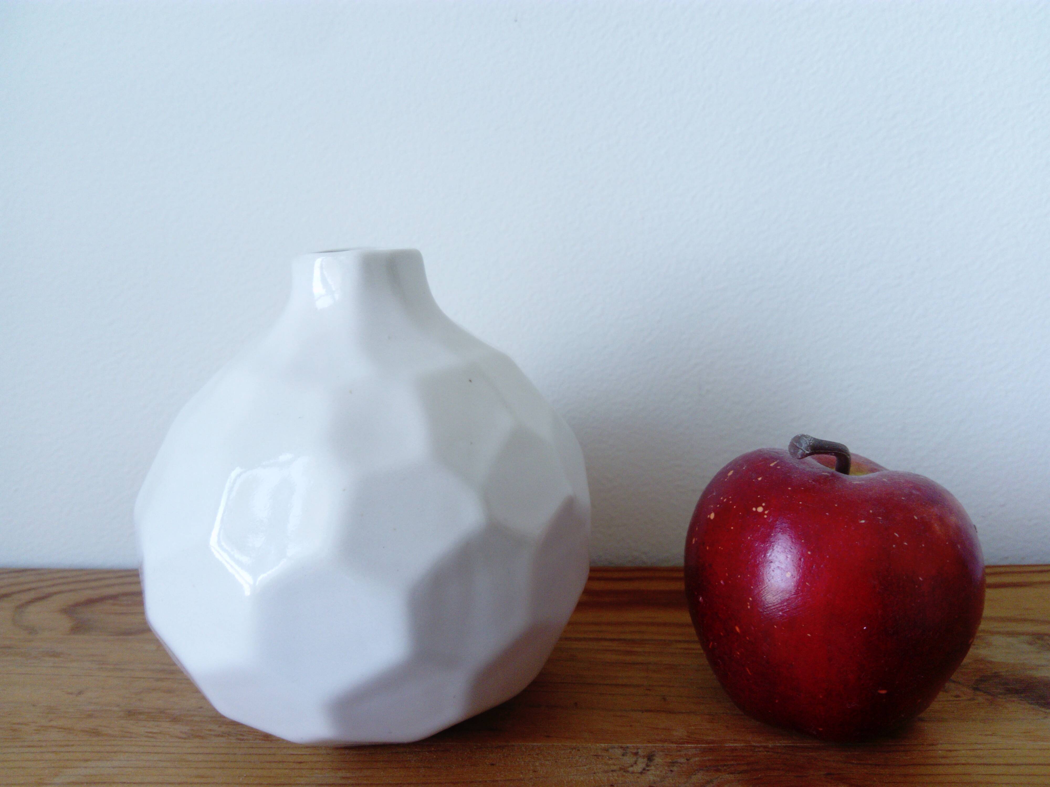 white ceramic faceted design vase