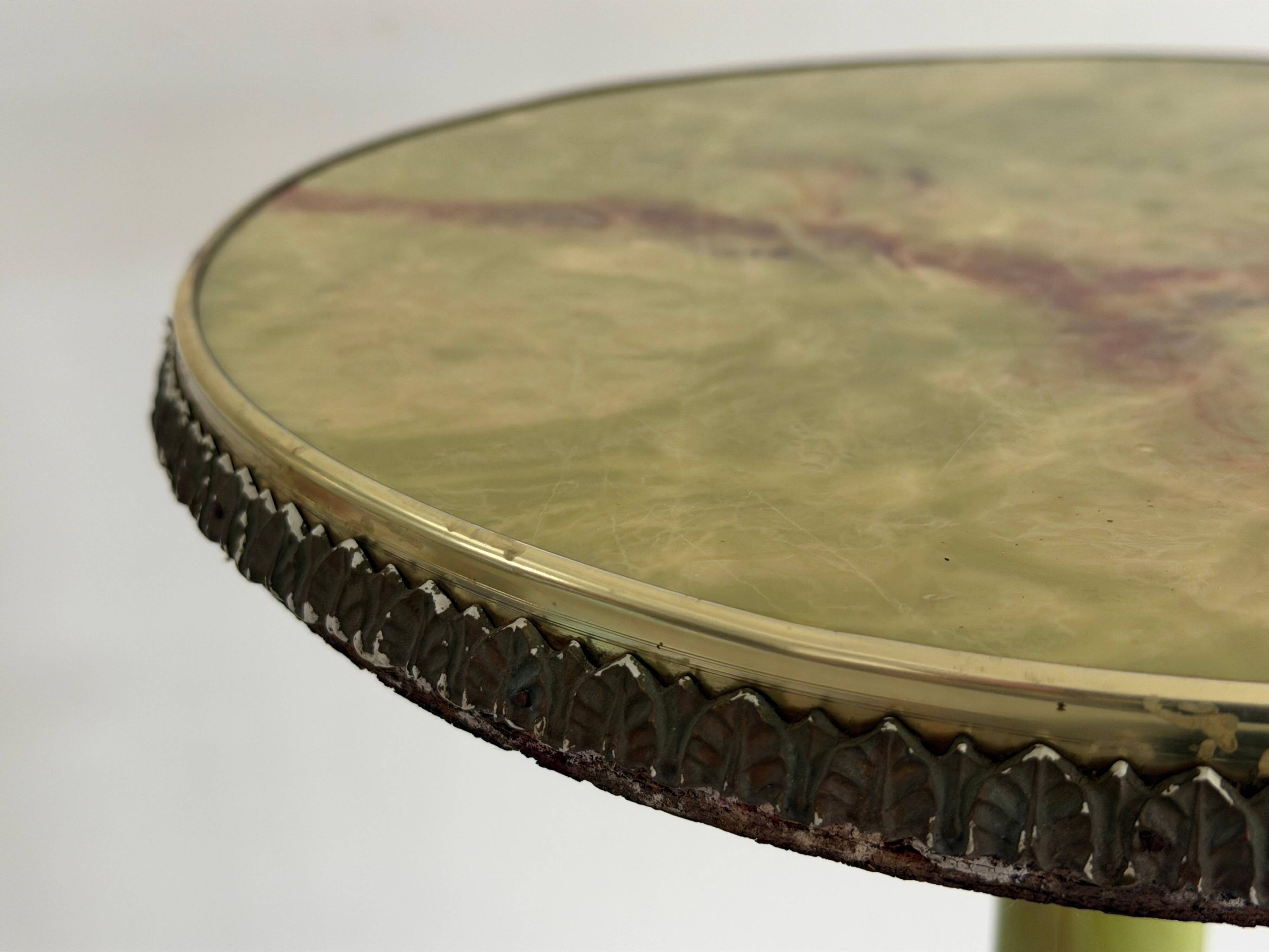 Mid-century side table in green marble with a brass base, 1960s, Italy.