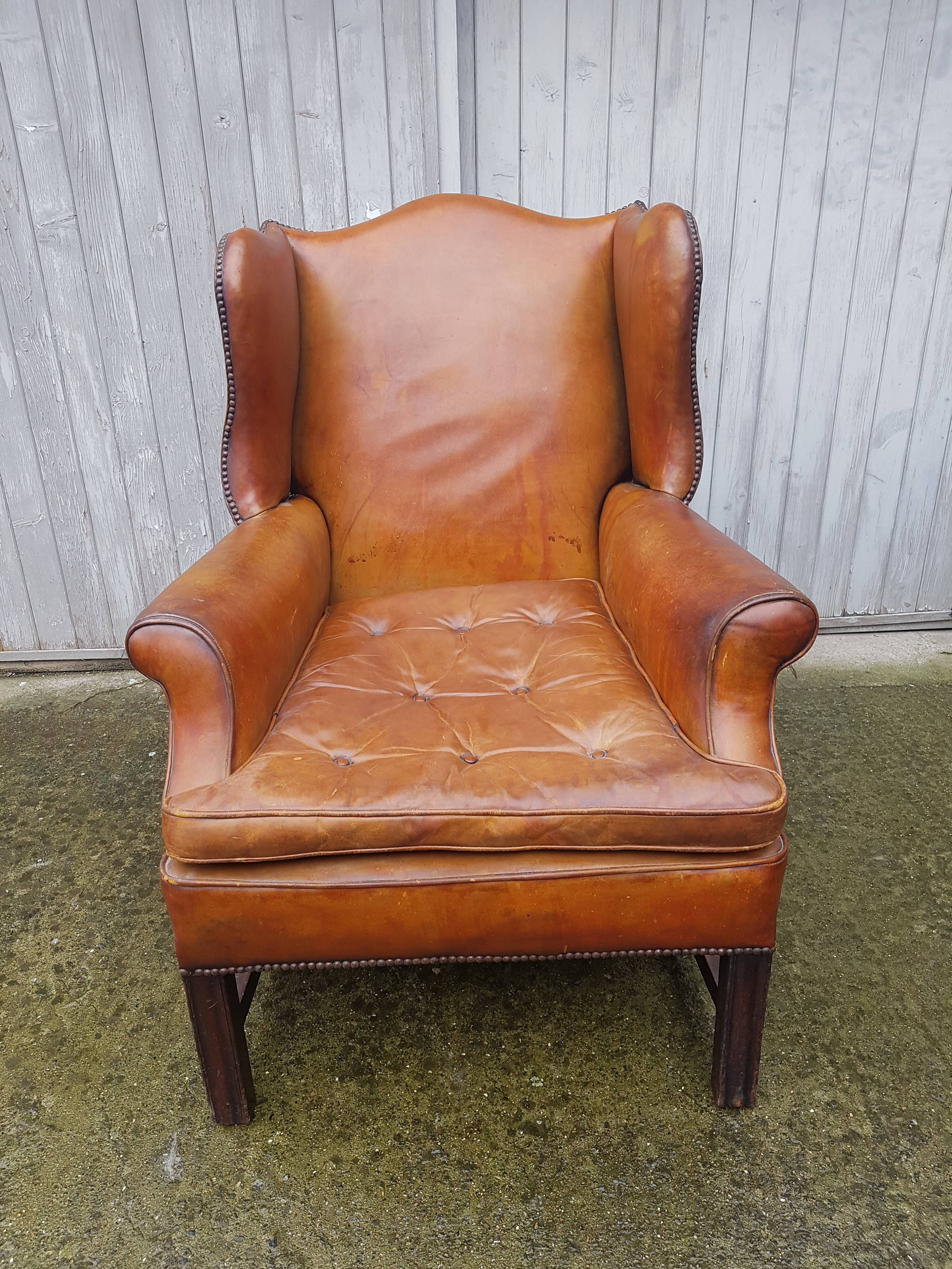 English fawn leather armchair with ears Chesterfield club
