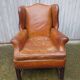 English fawn leather armchair with ears Chesterfield club