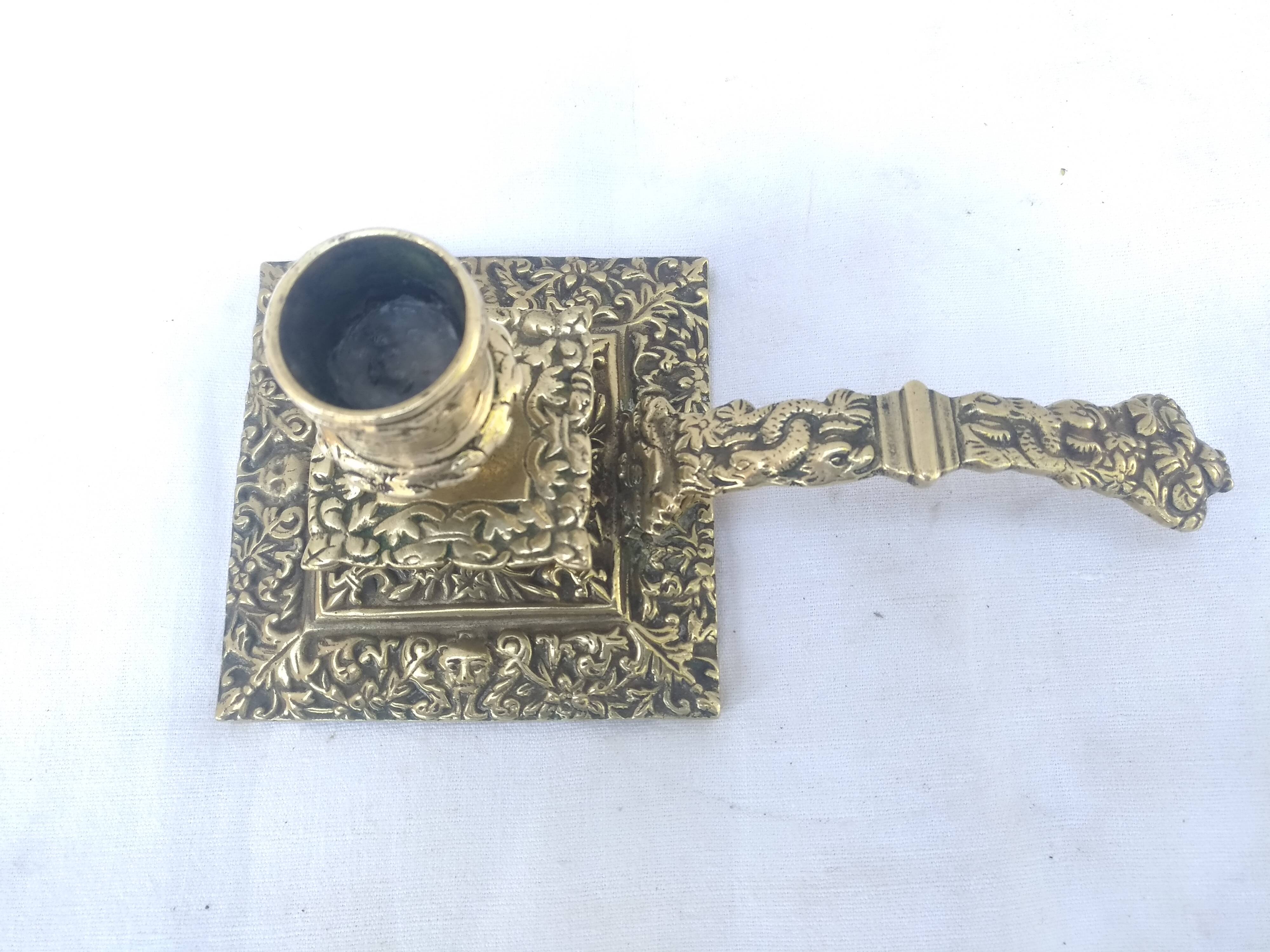 Bronze hand candlestick