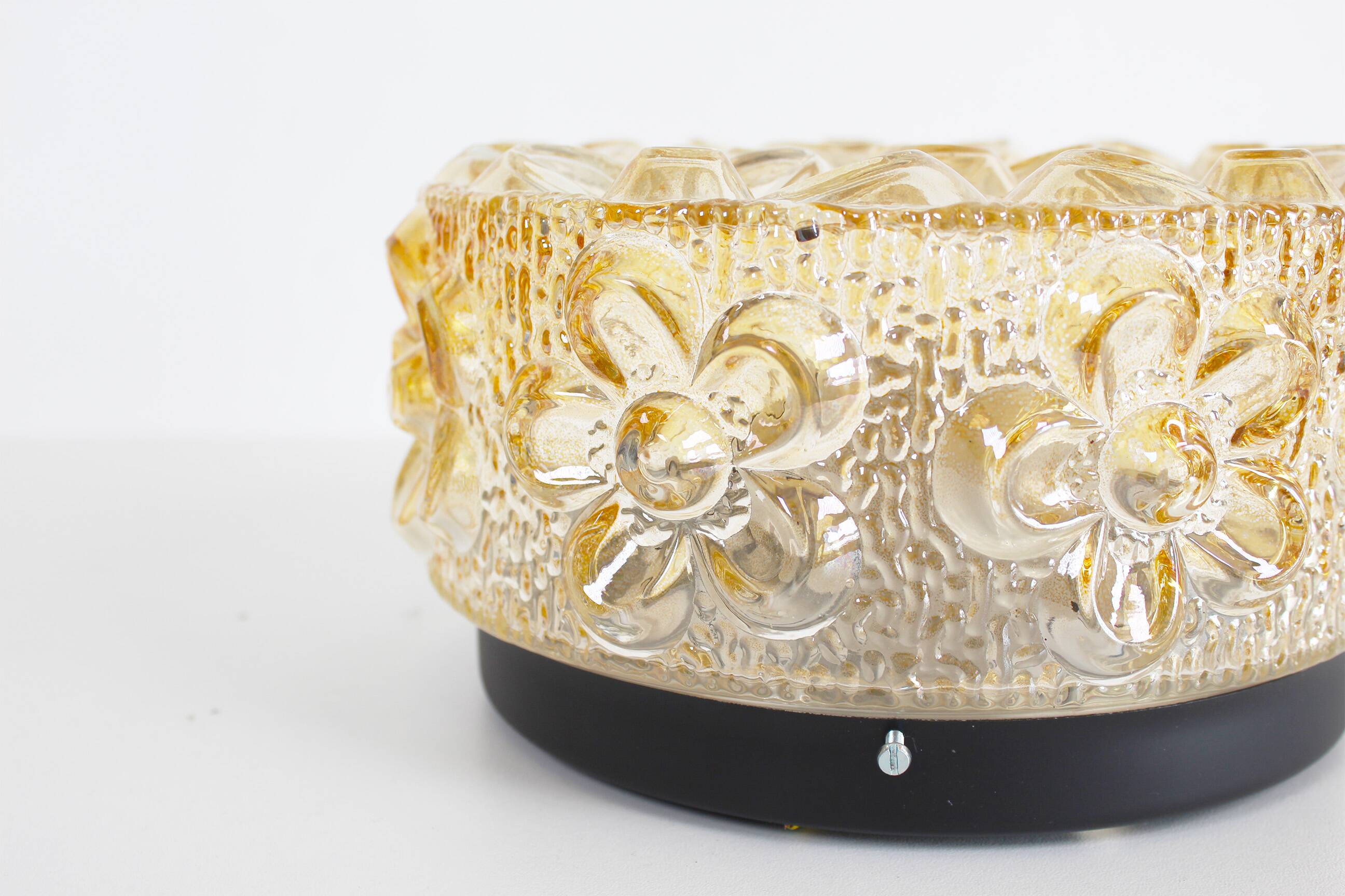 Original 1970’s amber Glass ‘Flower’ wall lamps by Erco