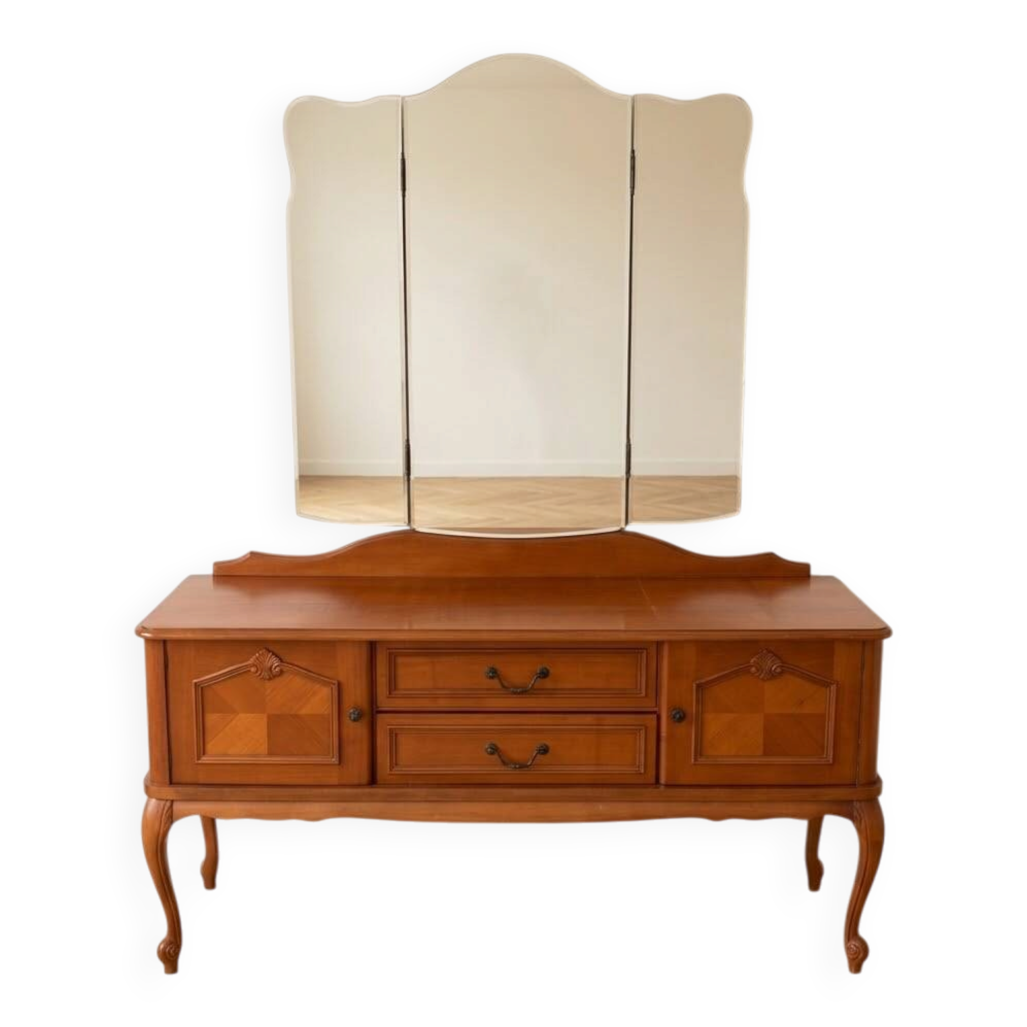 Antique wooden dressing table with a triptych mirror.