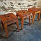 Set of 3 vintage French wooden stools from the 1950s.