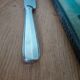Couteau de service lame courbe
