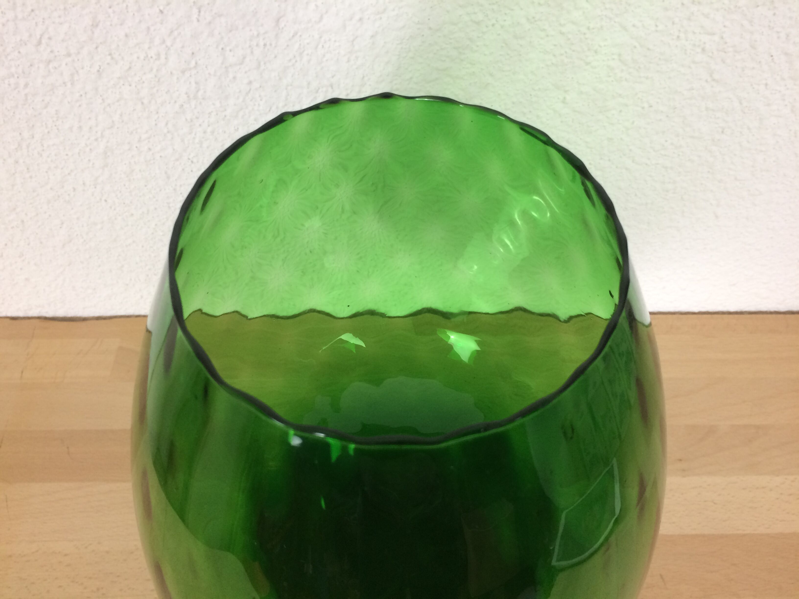 Green Empoli glass vase, cut on foot