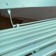 Former folding garden bench with wooden and metal slats