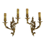 Vintage pair of double wall sconces in bronze from the 1960s.