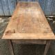Antique solid cherry farm table with 3 front drawers.